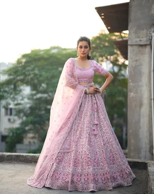HALFSAREE STUDIO Light Pink Party wear Heavy designer Net Lehenga Choli