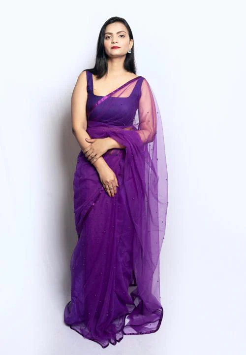 Wardrobe luxury purple net saree with pearl work