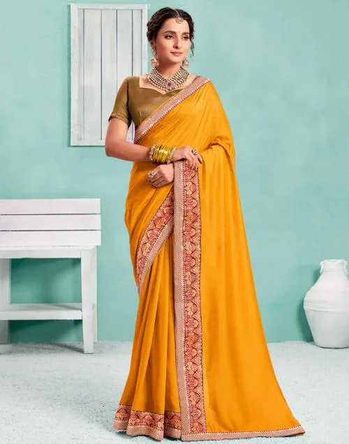 Buy Siril Women Silk Turmeric Yellow Jacquard Work On Lace & Dyed Saree