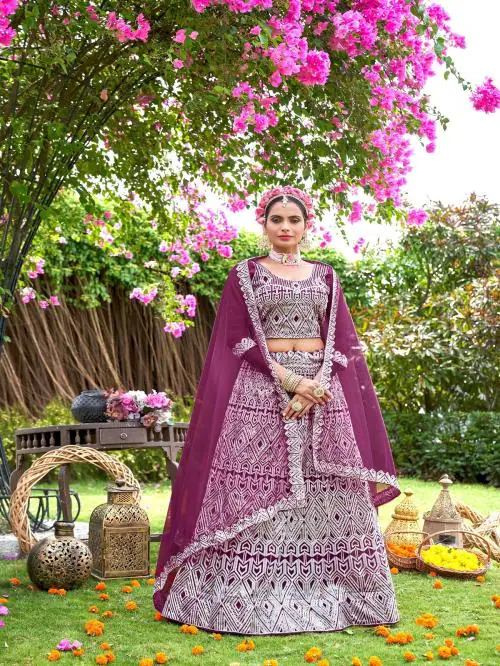 VARNI FABRICS: A Lady's First Love Graceful Beauty Embroidered Net Lehenga with Delicate Net Fabric Blouse in Purple
