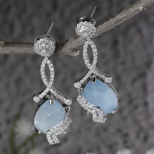 ZENEME Rhodium-Plated Blue & White American Diamond studded Trardrop Shaped Drop Earrings