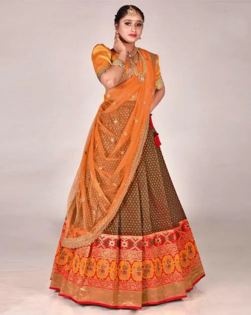 HALFSAREE STUDIO Dark Green Banarasi silk Woven Lehenga Choli with Dupatta