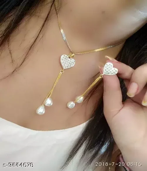 RIYA HANDICRAFT JEWELLERY Stud Earrings for Women & Girls - Gold Toned Sun Design Stud Earrings