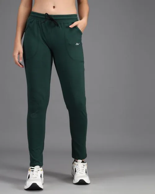 Buy ADDYVERO Solid Women Dark Green Track Pants Online at Best