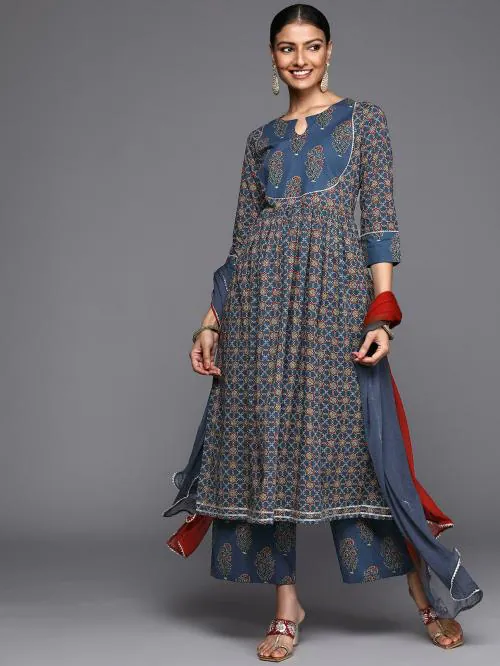KSUT(House of Varanga) blue and rust yoke style anarkali paired with printed palazzo and ombre dupatta